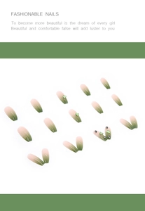 Detail of green aurora gradient press-on nails with heart rhinestones and square shape