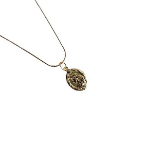 Elegant gold double-sided relief mermaid pendant necklace with a vintage snake chain