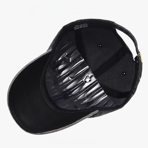 Detail view of cotton baseball cap interior with adjustable metal buckle and inner lining