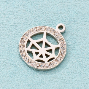 Polished silver stainless steel spider web pendant with clear cubic zirconia insets