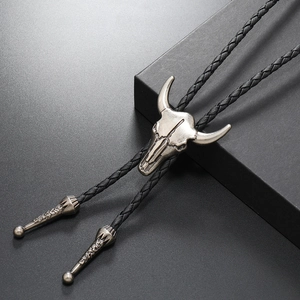 Vintage punk silver ox skull bolo tie with black braided PU leather cord and metal tips