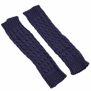 Detailed macro view of deep purple thick knit leg warmers with classic cable stitch pattern