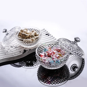 European style glass candy jars with lids featuring embossed diamond textures and ball handles
