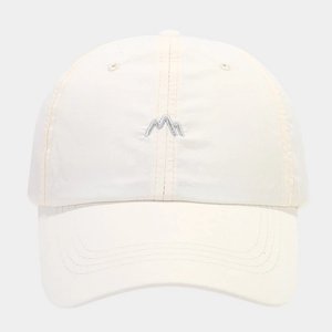 Close-up of gray mountain embroidery on a beige quick-dry outdoor baseball cap