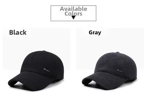 Detail view of winter baseball caps in black and grey with sport metal emblem