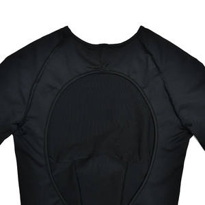 Detail shot of the back cutout and breathable mesh panel on the black slim jumpsuit