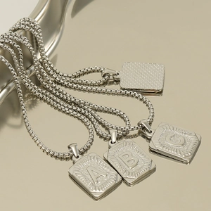 Classic silver square titanium steel letter necklaces A, B, C with radiant texture on box chains