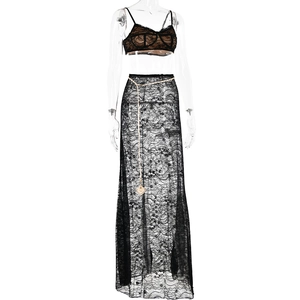 Detail of black lace two-piece set with a bra top and high-waisted skirt with gold chain
