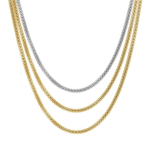 Detailed close-up of layered gold and silver popcorn mesh chain necklaces in 18K finish
