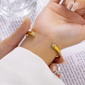 18K gold-plated C-shaped stainless steel cuff bracelet with sparkling crystal accents