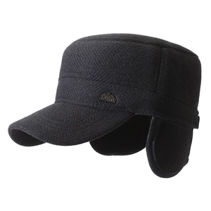 Winter men's flat top cap in black herringbone wool with ear flaps and metal logo