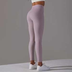 Close-up of lavender high-waisted yoga pants showing stretch fabric and slim fit