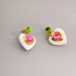 Fashionable gold-plated heart earrings with white resin and pink gemstone inlays