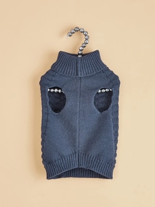 Detail view of navy blue pet knit sweater with high collar on a pearl hanger