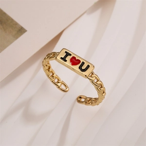 Close-up of golden Cuban chain ring featuring an I Love You red heart plate design