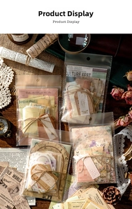 Macro shot of vintage junk journal paper kit with stamps and antique ephemera textures