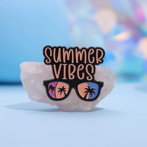 Cartoon Summer Vibes enamel pin with rainbow sunglasses and palm tree beach design
