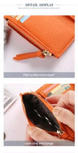 Detail of orange lychee leather wallet featuring premium gold zipper and large coin pocket