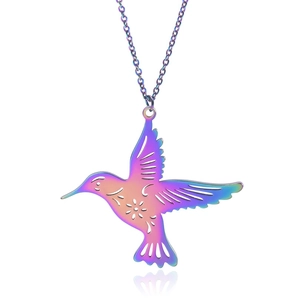 Detail of laser-cut hummingbird pendant in rainbow finish with delicate link chain