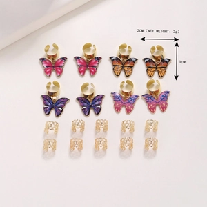 DIY butterfly braid rings set with colorful enamel charms and golden hollow hair loops
