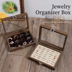 Walnut wood jewelry box set with glass lid and compartments for rings and necklaces