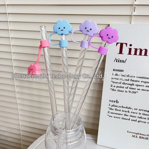 Cloud silicone dust caps on spiral glass straws in pink, blue, purple, and magenta colors