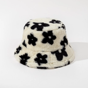 Detailed close-up of thickened faux fur texture and black floral pattern on the bucket hat