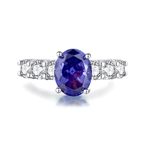 Elegant S925 sterling silver ring featuring an oval purple gemstone and sparkling zircons