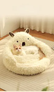 Detail showing the detached design of the plush koala-shaped pet bed for cats and dogs