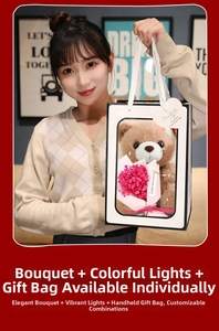 Ours en peluche marron et bouquet de fleurs roses dans un sac cadeau blanc avec LED