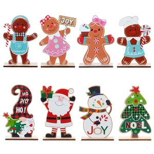 Set of 8 wooden Christmas tabletop decorations featuring gingerbread men and holiday figures