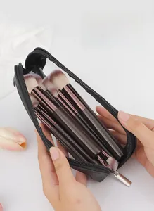 Portable black makeup brush case with clear PVC top and large zipper opening