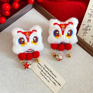 Traditional Chinese New Year dancing lion hair clips with red tassels and gold bells