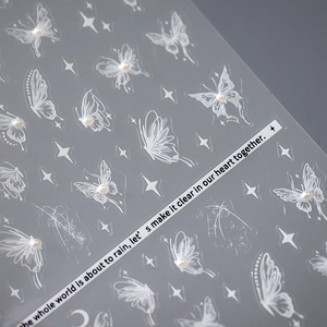 5D embossed white butterfly nail art stickers with 3D pearl accents and starry designs
