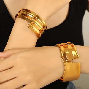 18k gold plated stainless steel wide cuff bracelet with unique wavy irregular texture