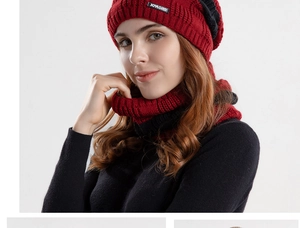 Detail of burgundy and black ribbed knit winter hat and scarf set with brand label