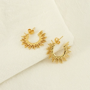 Polished gold sunburst C-shaped earrings with minimalist bohemian radiation pattern