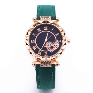 Elegant women's watch with heart rhinestone dial and dark green leather strap