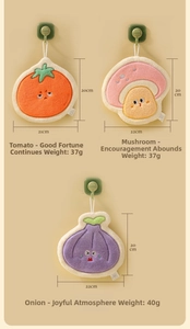 Three vegetable-shaped coral fleece hand towels with hanging hooks and size specifications