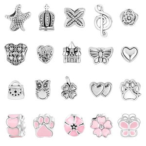 Detailed assortment of ocean-themed metal charms including starfish and crowns for DIY bracelets