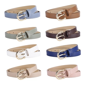 Eight minimalist women PU leather belts with gold metal D-rings in multiple colors