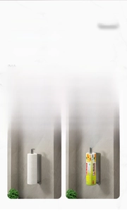 Detail view of wall-mounted dark gray metal kitchen rack holding paper towels and wrap
