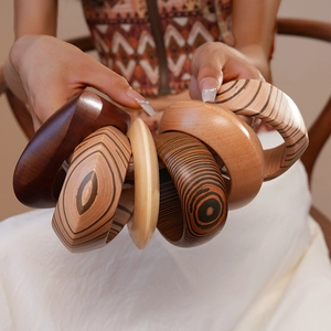 Vintage wooden bangle bracelet with natural wood grain texture for women in retro style