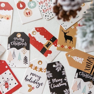 Festive Christmas gift tags with reindeer and Santa designs on white background