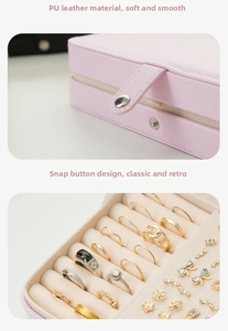 Macro detail of pink PU leather jewelry box showing metal snap button and soft texture