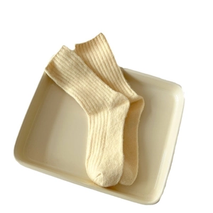 Thick ribbed knit wool crew socks for women in cream beige for winter comfort