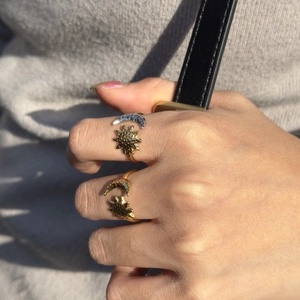 Adjustable stainless steel sun and moon rings with hammered 18K gold plated finish
