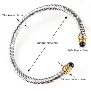 Detail view of 5mm twisted cable bracelet with 60mm diameter and black agate inlay