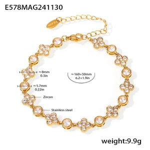 Detail of 18K gold plated stainless steel clover bracelet with pavé cubic zirconia