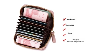 Pink RFID accordion wallet showing multiple card slots and leather texture